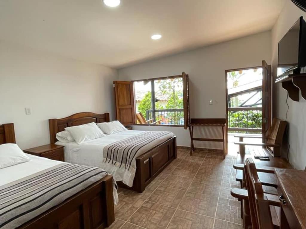 Hotel Bosques Del Saman Alcala กิมบายา ภายนอก รูปภาพ